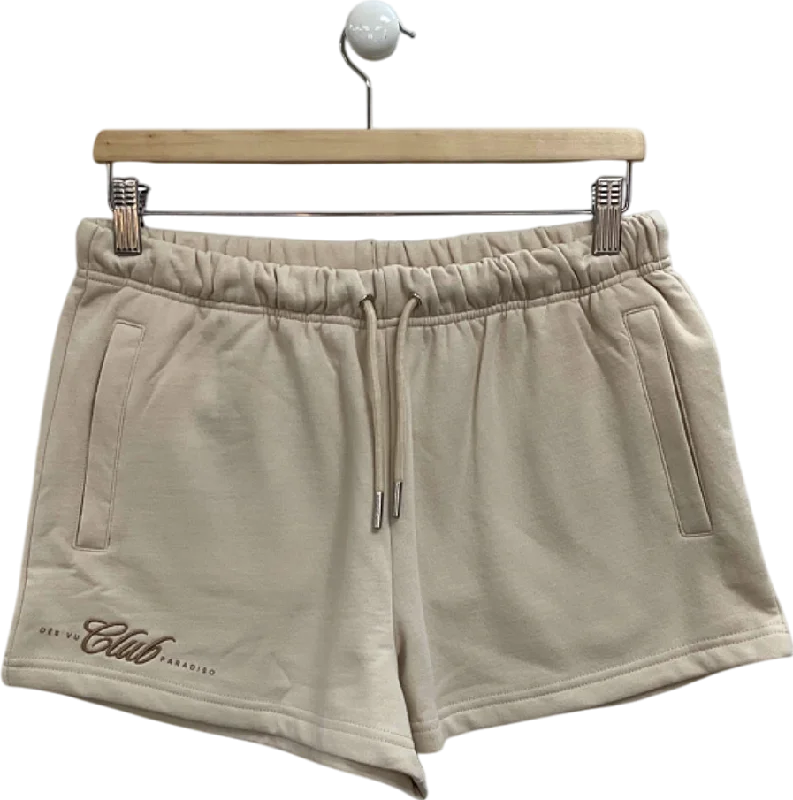 Culottes – Wide-legged, knee-length or mid-calf shorts that resemble a skirt but are more comfortable and practical.Des Vu Beige Club Paradiso Shorts UK S