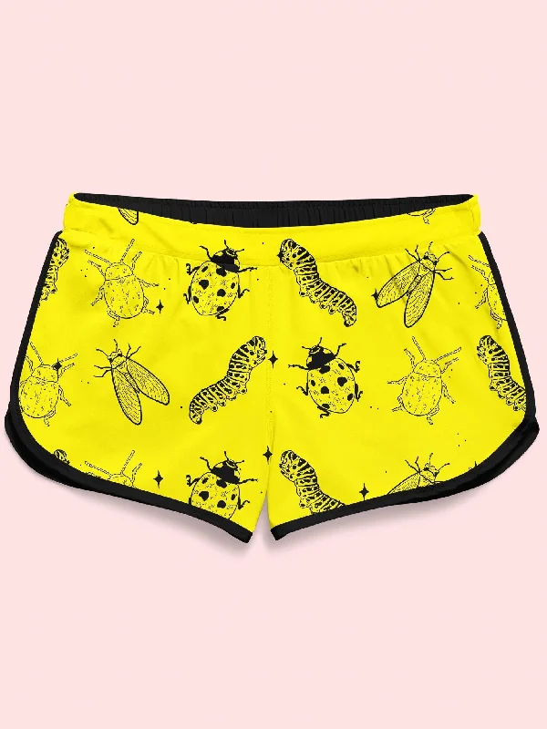 Velvet shorts – Luxurious, soft shorts made from velvet material, often worn for more festive or evening occasions.Neon Bugs Retro Shorts