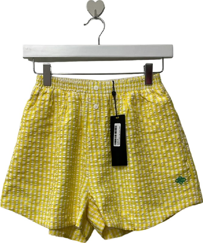 Culottes – Wide-legged, knee-length or mid-calf shorts that resemble a skirt but are more comfortable and practical.The Couture Club Yellow Gingham Shorts UK 8