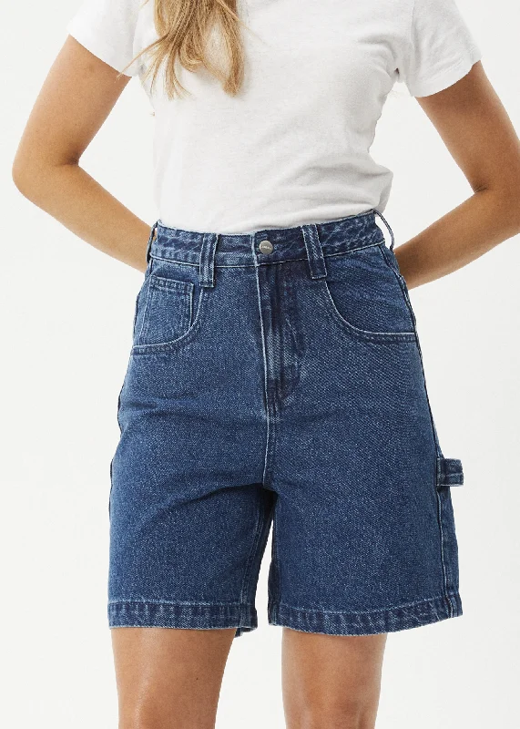 Cargo shorts – Loose-fitting shorts with large side pockets, often made from durable material for a utilitarian look.AFENDS Womens Emilie - Denim Workwear Short - Authentic Blue