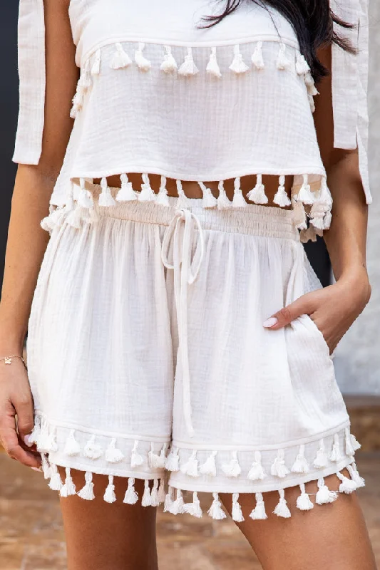 Culottes – Wide-legged, knee-length or mid-calf shorts that resemble a skirt but are more comfortable and practical.Chasing The Tides Cream Shorts With Fringe FINAL SALE