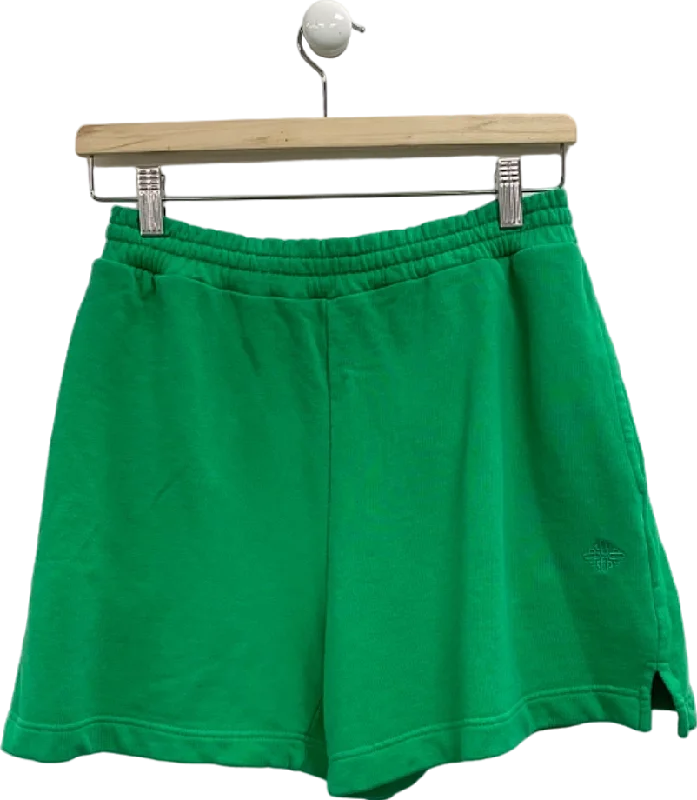 Plaid shorts – Shorts with a checkered pattern, typically in bright or earthy tones for a fun, preppy look.The Couture Club Green Shorts UK 10