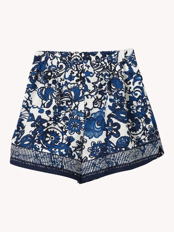 Cut-off shorts – Shorts made by cutting denim or other fabric, typically frayed at the edges for a distressed look.TRISH SHORTS