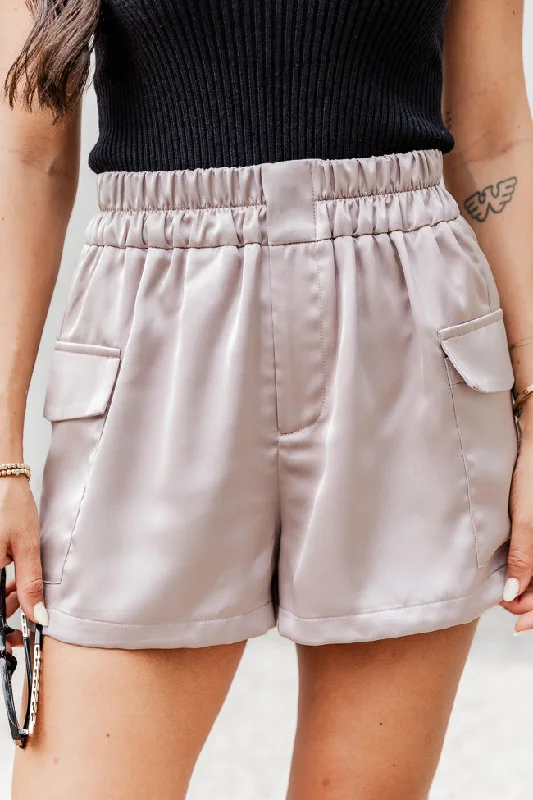 Boyfriend shorts – Relaxed, loose-fit shorts with a slightly longer inseam, often rolled up at the hem for a casual appearance.The Right Move Taupe Satin Cargo Shorts FINAL SALE