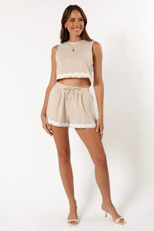 Culottes – Wide-legged, knee-length or mid-calf shorts that resemble a skirt but are more comfortable and practical.Mirabel Shorts - Beige/White