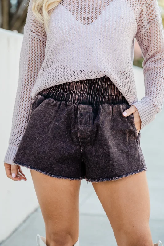 Paperbag waist shorts – Shorts with a gathered, elastic waist and often a belt, creating a relaxed and stylish fit.Let's Run Away Black Acid Wash Smocked Shorts FINAL SALE