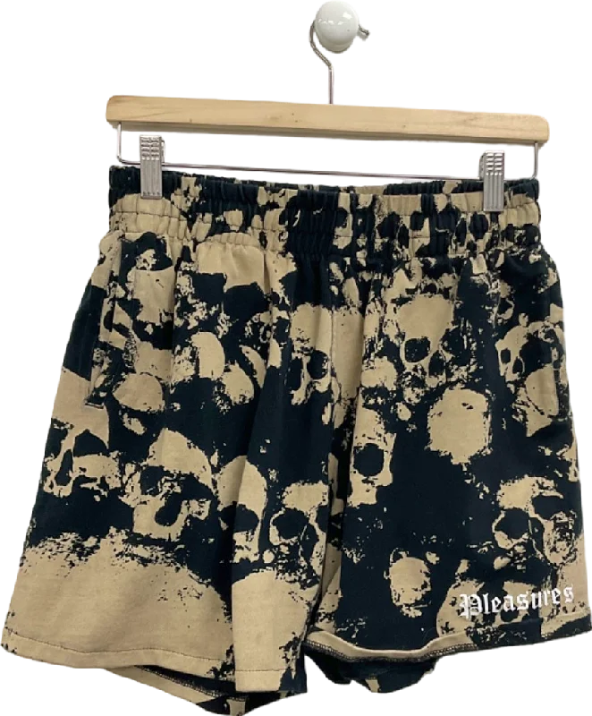 Bermuda shorts – Knee-length shorts that offer a more conservative and comfortable fit.Pleasures Black/Beige Skull Print Shorts