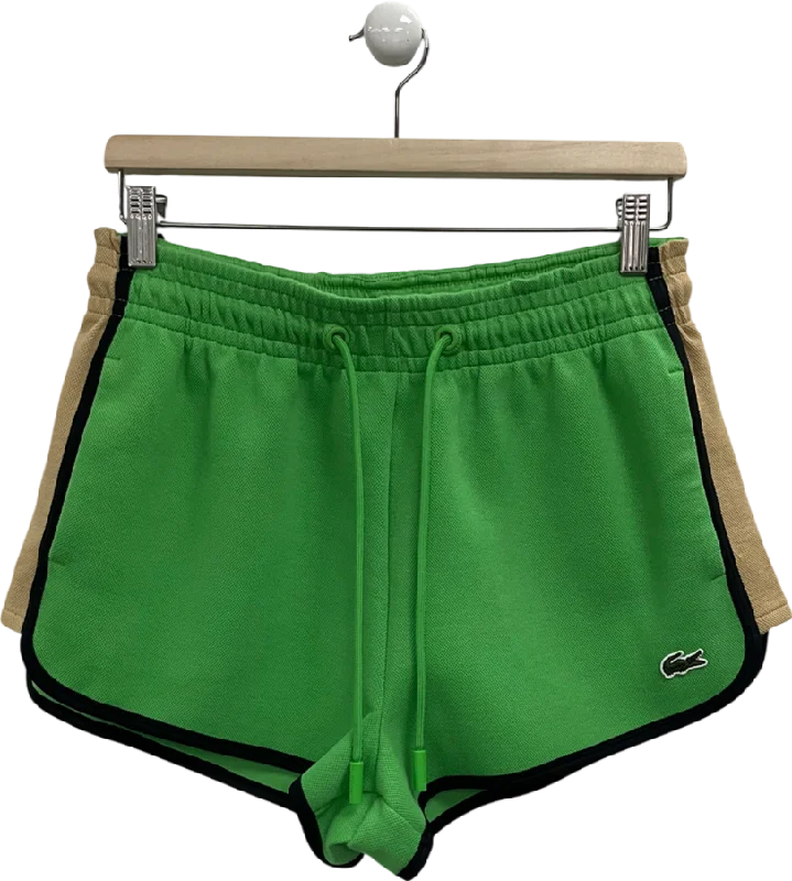 Paperbag waist shorts – Shorts with a gathered, elastic waist and often a belt, creating a relaxed and stylish fit.Lacoste Green Tracksuit Shorts UK 8