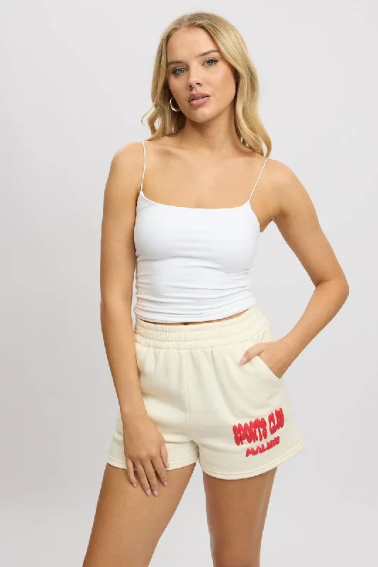 Cut-off shorts – Shorts made by cutting denim or other fabric, typically frayed at the edges for a distressed look.White Track Shorts High Rise Elastic Waist