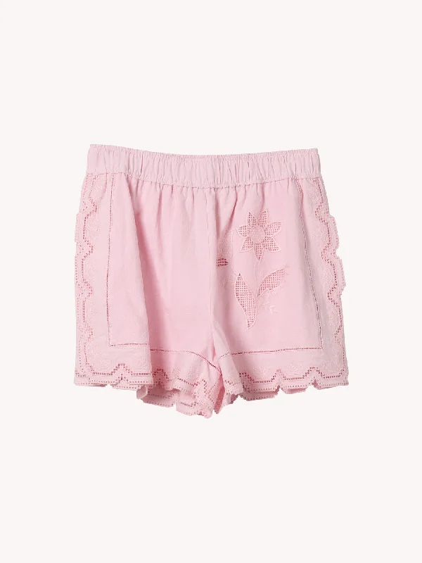 Lace shorts – Shorts made from delicate lace fabric, often worn for a dressier or romantic look.TABLECLOTH LACE SHORTS