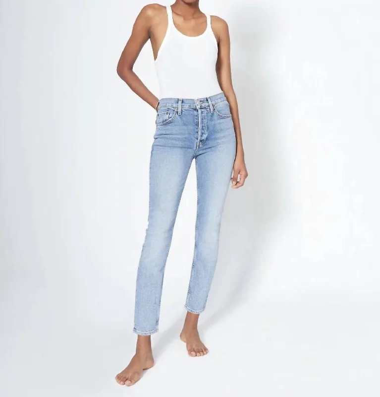 Tapered trousers – Trousers that narrow toward the ankle, creating a more fitted, streamlined look.90's High Rise Ankle Crop Jean In Mid 90's