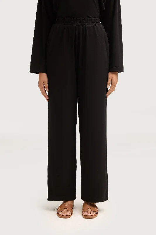 High-waisted trousers – Trousers that sit above the waistline for a flattering, elongating look.Aria Ribbed Everyday Wide Leg Pants - Black