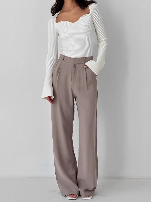 Bootcut trousers – Slightly flared at the bottom, designed to accommodate boots underneath.BerryBetty - Business Casual Pleat Wide Leg Dress Pants