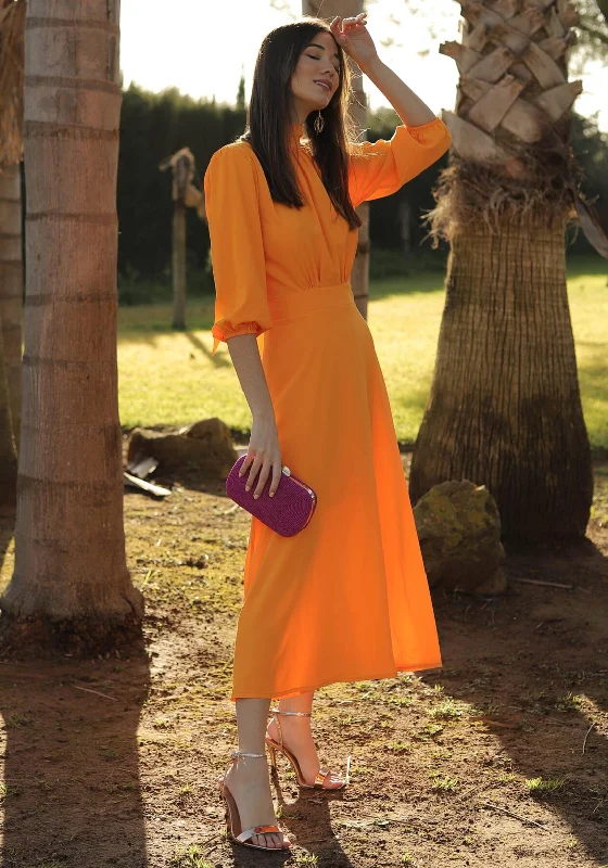 Midi dress – Dress that falls to the mid-calf, giving a balanced, modest, yet stylish appearance.Cayro Pansy A Line Maxi Dress, Mango