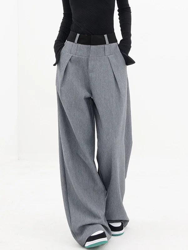 Cargo trousers – Loose-fitting trousers with large pockets on the sides, often made from durable materials.BerryBetty - Contrast Binding Wide Leg Pants