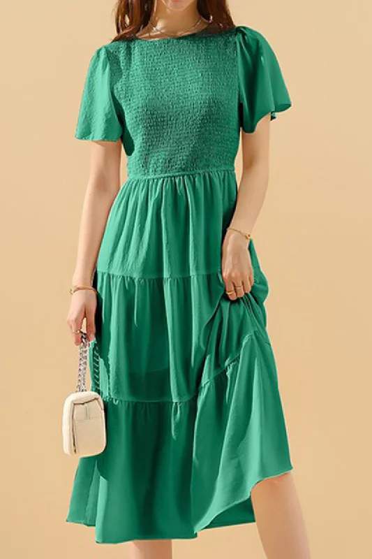 A-line dress – Dress that is fitted at the top and gradually flares out, creating an A-shape silhouette.SHORT BELL SLEEVE CREW NECK SWING DRESS