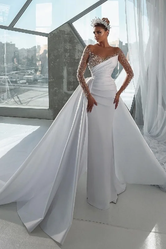 Wrap dress – Dress that wraps around the body and ties at the waist, creating a flattering and adjustable fit.Illusion Neckline Luxury Beads Long Sleeves Wedding Dress QW0926