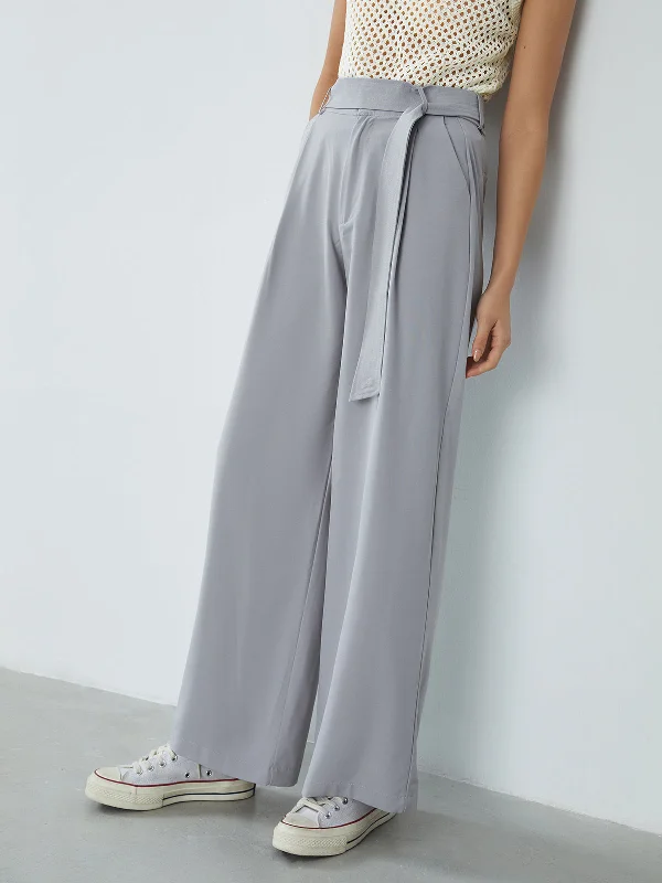 Slim-fit trousers – Trousers that are form-fitting and narrow through the legs.BerryBetty - Effortless Belted Wide Leg Pants