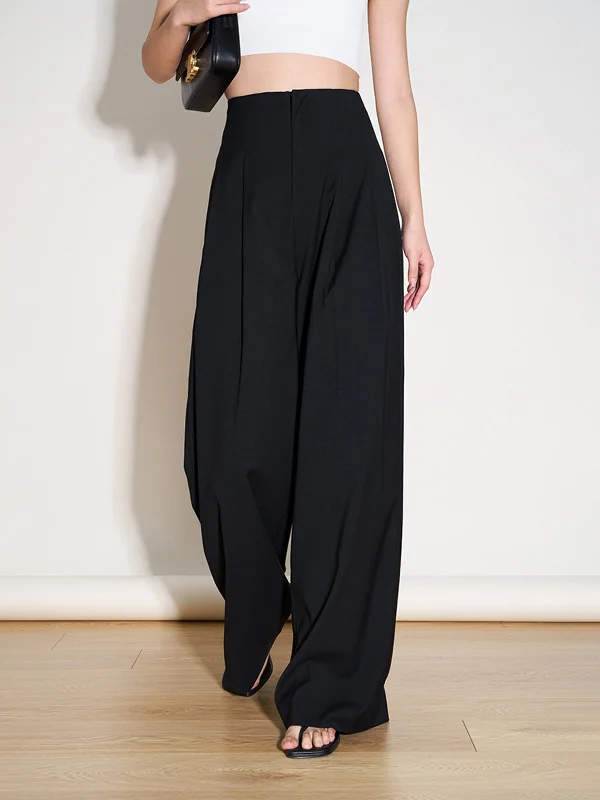 Flared trousers – Trousers with a gradual flare from the knee down, often associated with retro or 1970s fashion.BerryBetty - Effortless Flowy Wide Leg Dress Pants