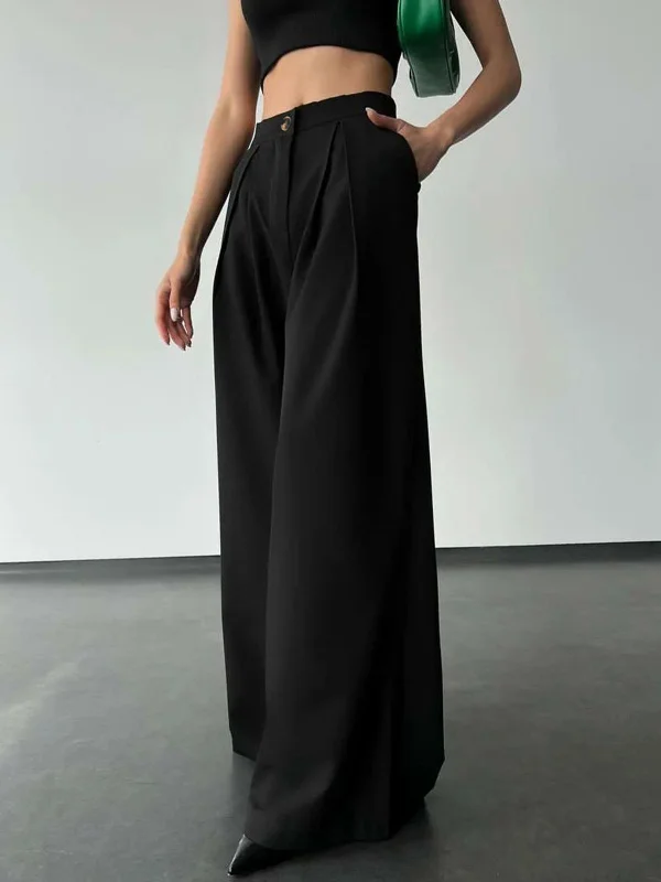 Palazzo trousers – Wide-leg trousers made from light, flowy fabric, often associated with a chic or bohemian look.BerryBetty - Effortless Oversized Wide Leg Pants