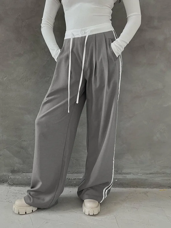 Paperbag waist trousers – Trousers with a gathered waistband, often cinched with a belt for added style.BerryBetty - Everyday Wide Leg Pants