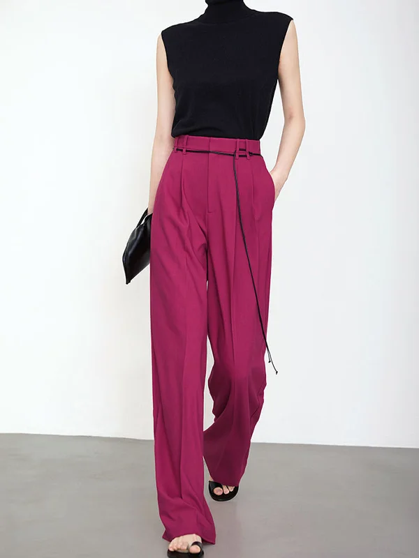 Pleated trousers – Trousers with folds or pleats in the front, often adding volume or texture to the garment.BerryBetty - Full Length String Decor Pleated Wide Leg Pants