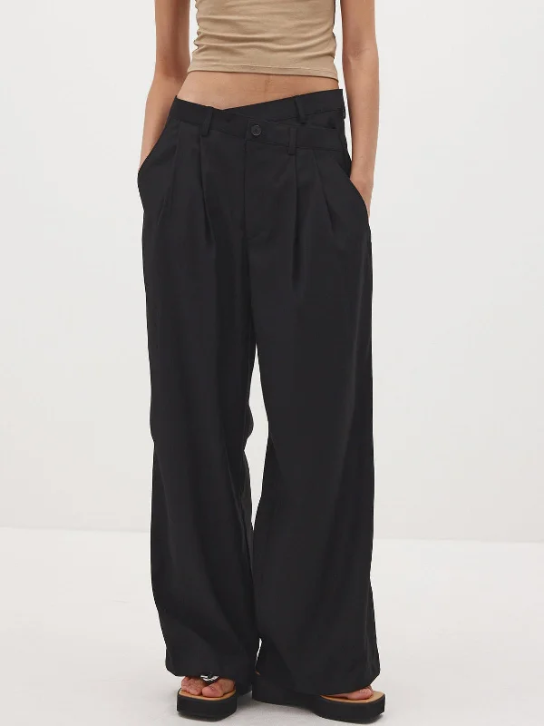 Palazzo trousers – Wide-leg trousers made from light, flowy fabric, often associated with a chic or bohemian look.BerryBetty - Low Rise Criss Cross Suit Pants