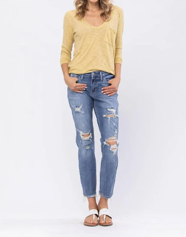 Cropped trousers – Trousers that are shortened to a length above the ankle.Mid Rise Destroyed Boyfriend Jean In Blue