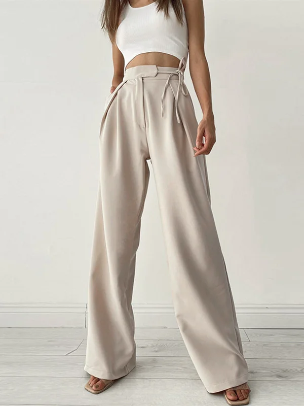 Tapered trousers – Trousers that narrow toward the ankle, creating a more fitted, streamlined look.BerryBetty - Palazzo Tied Wide Leg Dress Pants