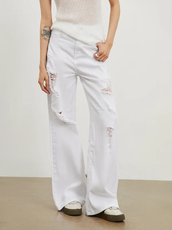 Tapered trousers – Trousers that narrow toward the ankle, creating a more fitted, streamlined look.BerryBetty - Ripped White Denim Straight Leg Jeans