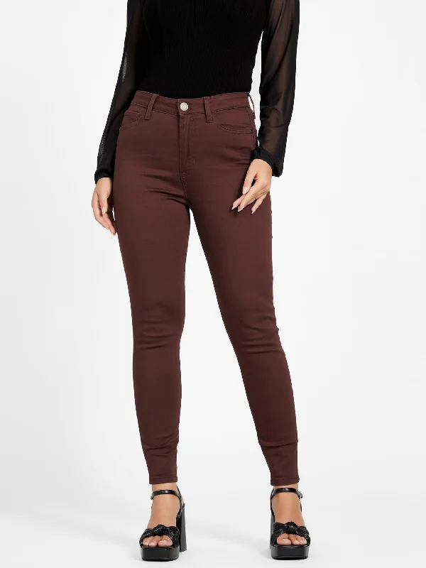 Button-front trousers – Trousers that feature a row of buttons along the waistband for a stylish detail.Simmone High-Rise Skinny Jeans