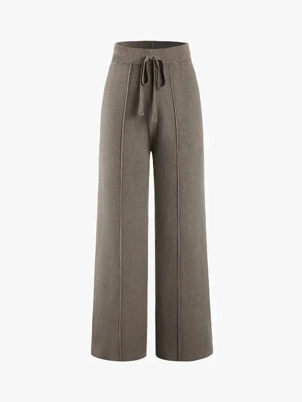 Paperbag waist trousers – Trousers with a gathered waistband, often cinched with a belt for added style.BerryBetty - Solid Rib Drawstring Wide Leg Pants