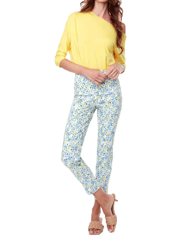 Flared trousers – Trousers with a gradual flare from the knee down, often associated with retro or 1970s fashion.Speckles Print Pant In Blue/yellow