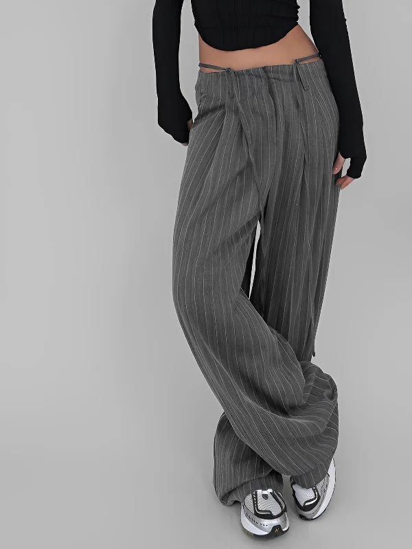 Paperbag waist trousers – Trousers with a gathered waistband, often cinched with a belt for added style.BerryBetty - Tied Pinstripe Tailored Pants