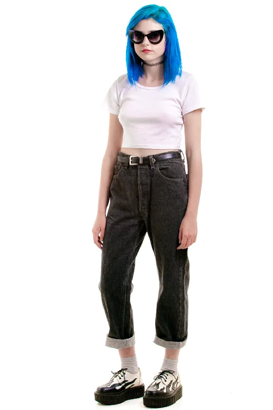 Paperbag waist trousers – Trousers with a gathered waistband, often cinched with a belt for added style.SOLD!