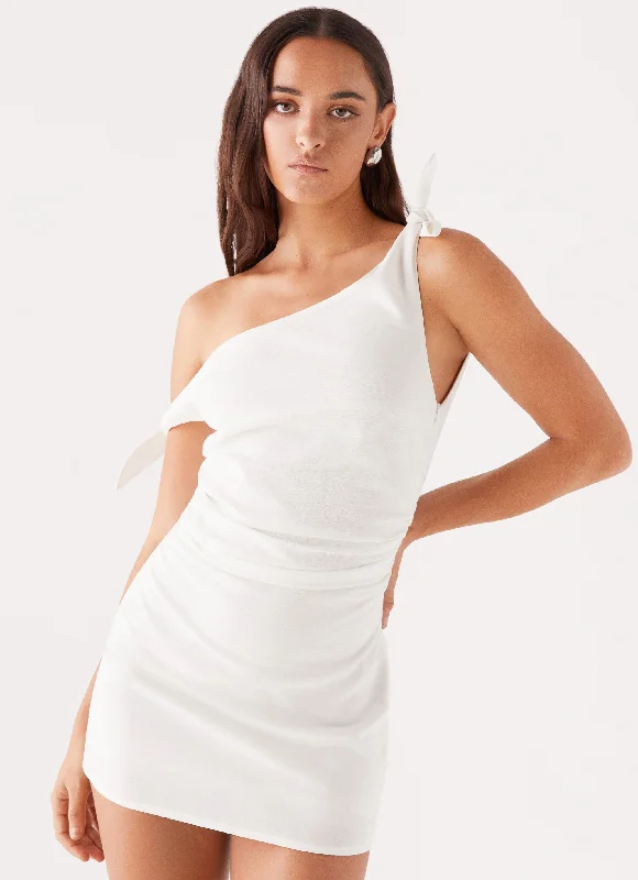 A-line skirt – Skirt that is fitted at the hips and gradually flares out toward the hem.Amazonia Linen Mini Dress - White