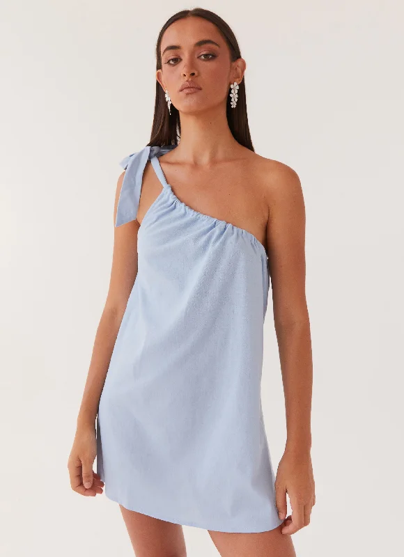 Tiered skirt – Skirt made from multiple layers or tiers of fabric, creating a ruffled or flowing appearance.Art Of Waves Linen Mini Dress - Cerulean