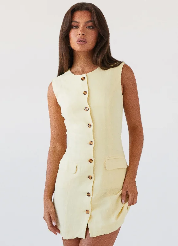 Ruffle skirt – Skirt with ruffled edges or layers, adding movement and texture.Castello Fiore Linen Mini Dress - Lemon