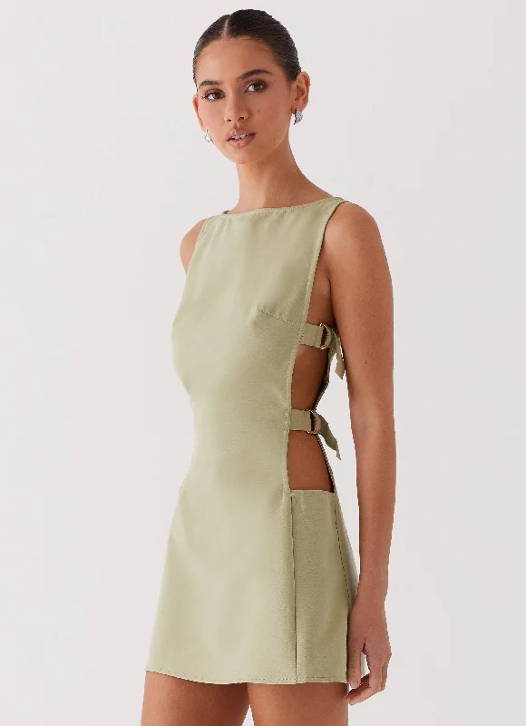 Button-front skirt – Skirt with a row of buttons down the front for a vintage-inspired look.Cherish You Buckle Mini Dress - Olive