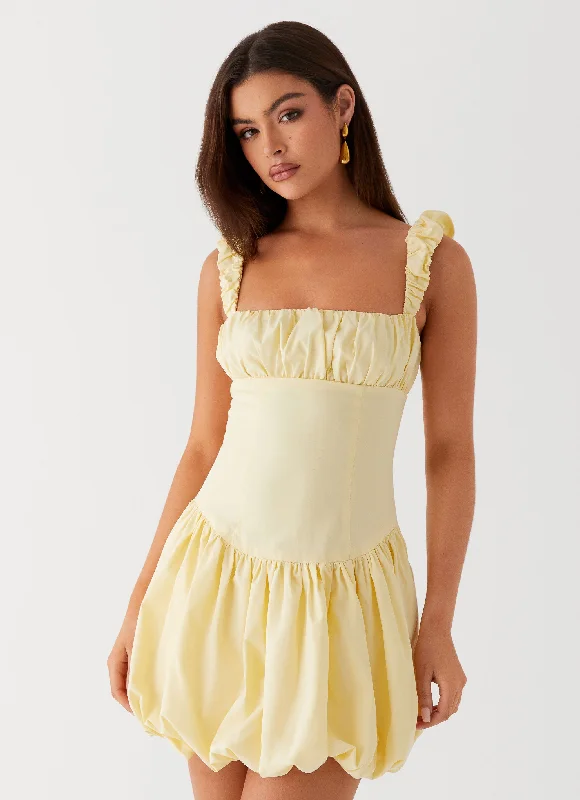 Belted skirt – Skirt that includes a belt at the waist for added detail and definition.Clove Mini Dress - Yellow