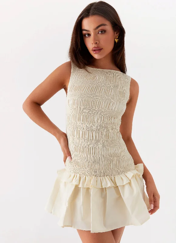 Tulle skirt – Skirt made from tulle fabric, typically voluminous and lightweight, often used for dressy or formal occasions.Garden Kisses Shirred Mini Dress - Ivory