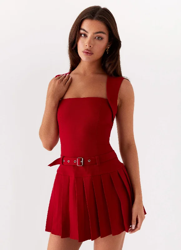 Maxi skirt – Skirt that reaches the ankles or floor, offering a long, flowing silhouette.Justina Belted Mini Dress - Red