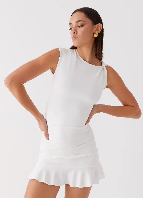 Chiffon skirt – Lightweight, semi-sheer skirt made from chiffon fabric for a breezy and elegant look.Katy Frill Mini Dress - Ivory