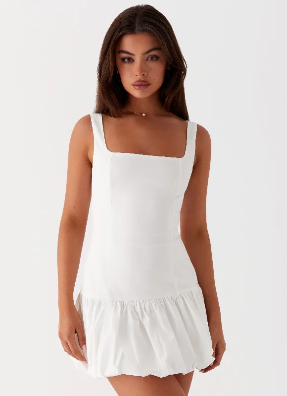 Denim skirt – Skirt made from denim fabric, often casual and versatile.Lexy Mini Dress - Ivory