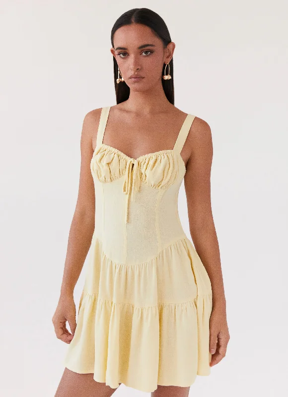 Midi skirt – Skirt that falls to the mid-calf, creating a more modest and elegant look.Lucie Linen Mini Dress - Yellow