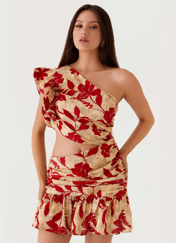 Tiered skirt – Skirt made from multiple layers or tiers of fabric, creating a ruffled or flowing appearance.Maisie Linen Mini Dress - Red Green Floral