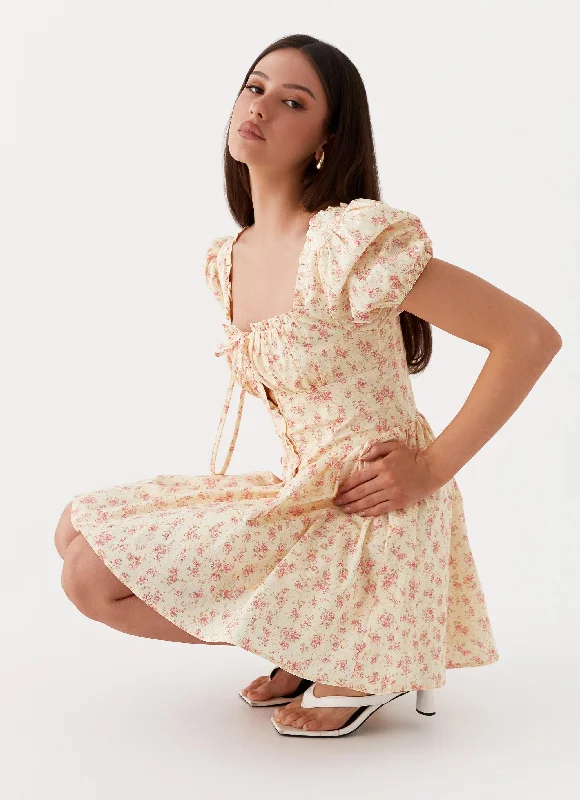 Button-front skirt – Skirt with a row of buttons down the front for a vintage-inspired look.Mila Mini Dress - Yellow Ditsy Floral