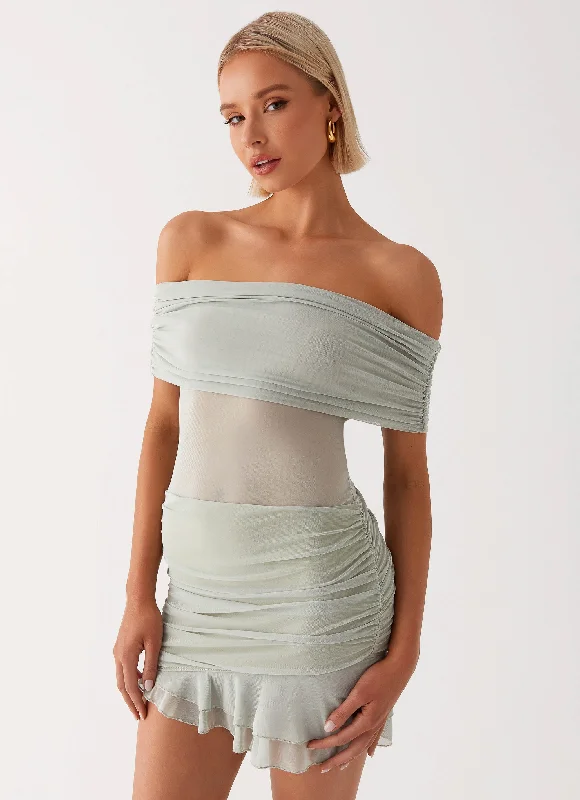 Tiered skirt – Skirt made from multiple layers or tiers of fabric, creating a ruffled or flowing appearance.Nelly Off Shoulder Mini Dress - Pistachio