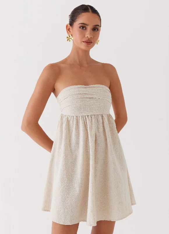 Skater skirt – Flared skirt that is fitted at the waist and flares out, resembling the shape of a skating skirt.Night Changes Linen Mini Dress - Oatmeal