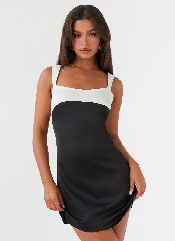 High-waisted skirt – Skirt that sits above the natural waistline, creating a flattering silhouette.Odette Satin Mini Dress - Onyx